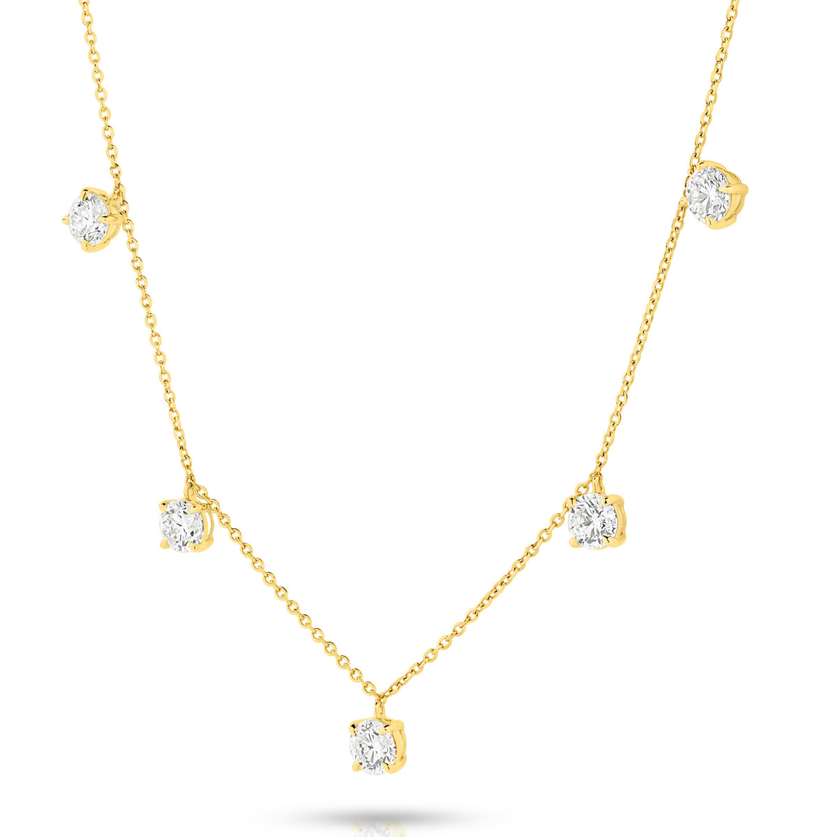 A delicate yellow gold necklace featuring five round-cut lab-grown diamonds spaced along the chain, set against a plain white background - The Jewel Concierge