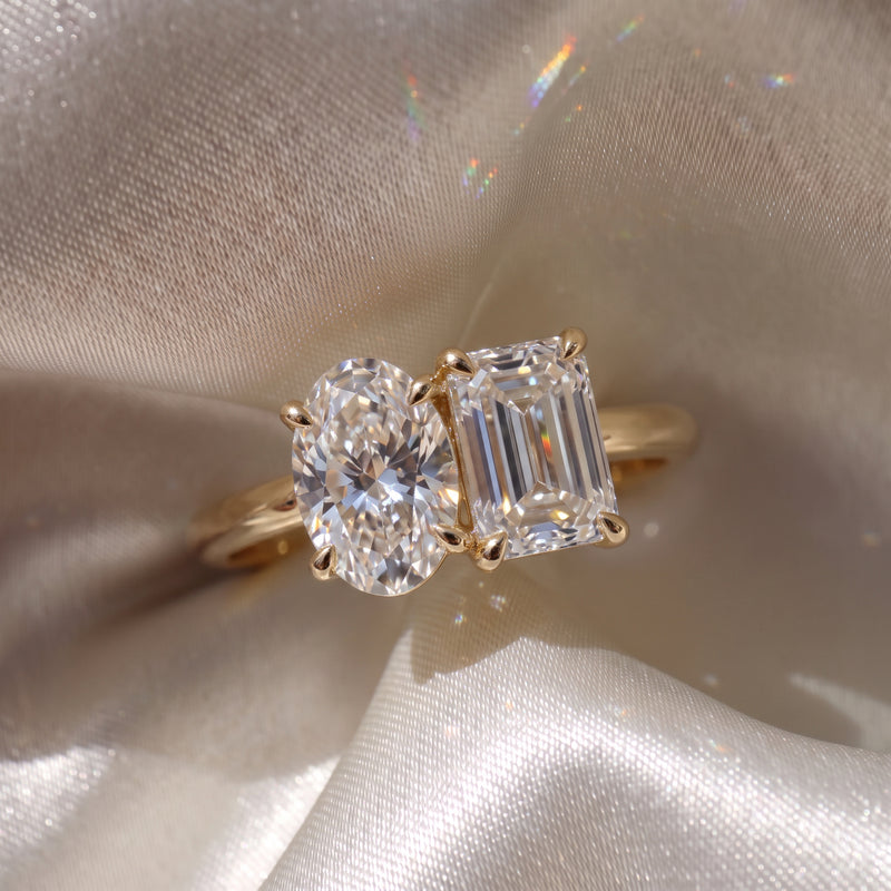 The Luise Ring — Oval and Emerald Toi Et Moi Lab-Grown Diamond Engagement Ring in Yellow Gold | The Jewel Concierge