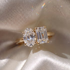 The Luise Ring — Oval and Emerald Toi Et Moi Lab-Grown Diamond Engagement Ring in Yellow Gold | The Jewel Concierge