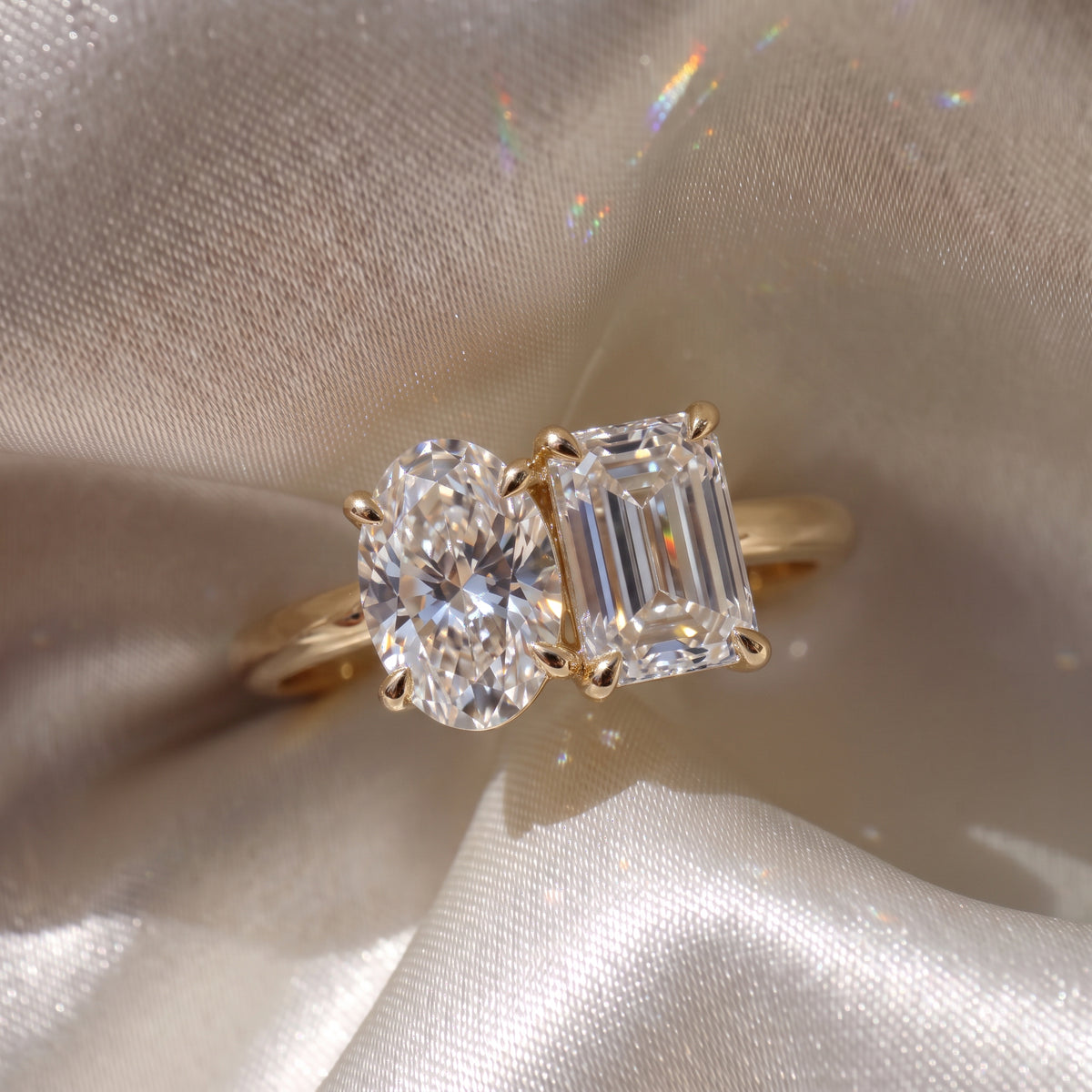 The Luise Ring — Oval and Emerald Toi Et Moi Lab-Grown Diamond Engagement Ring in Yellow Gold | The Jewel Concierge