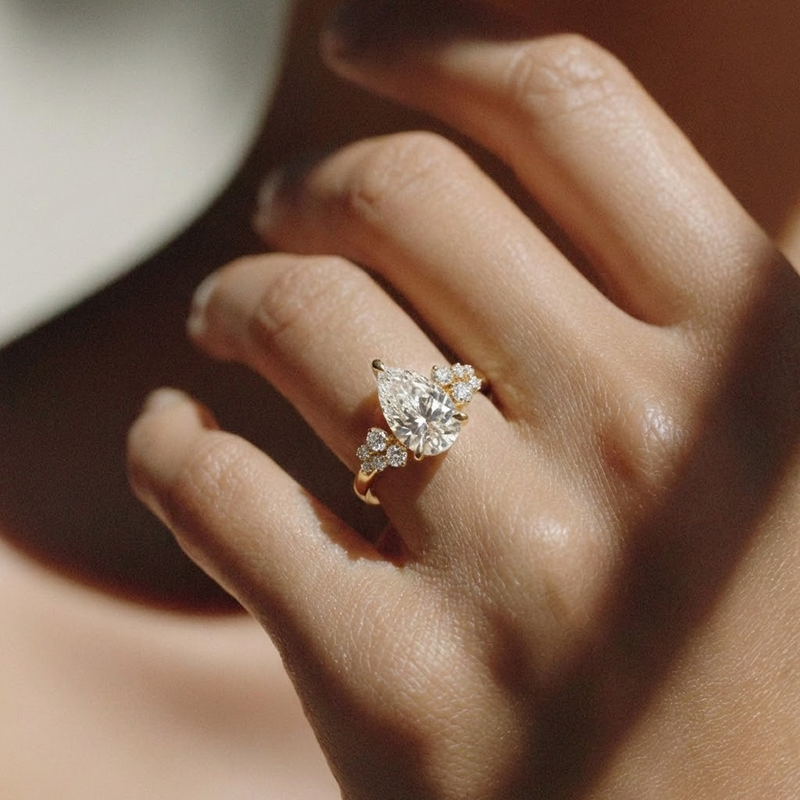 The Lumina Ring - Pear with Round Brilliant Accents