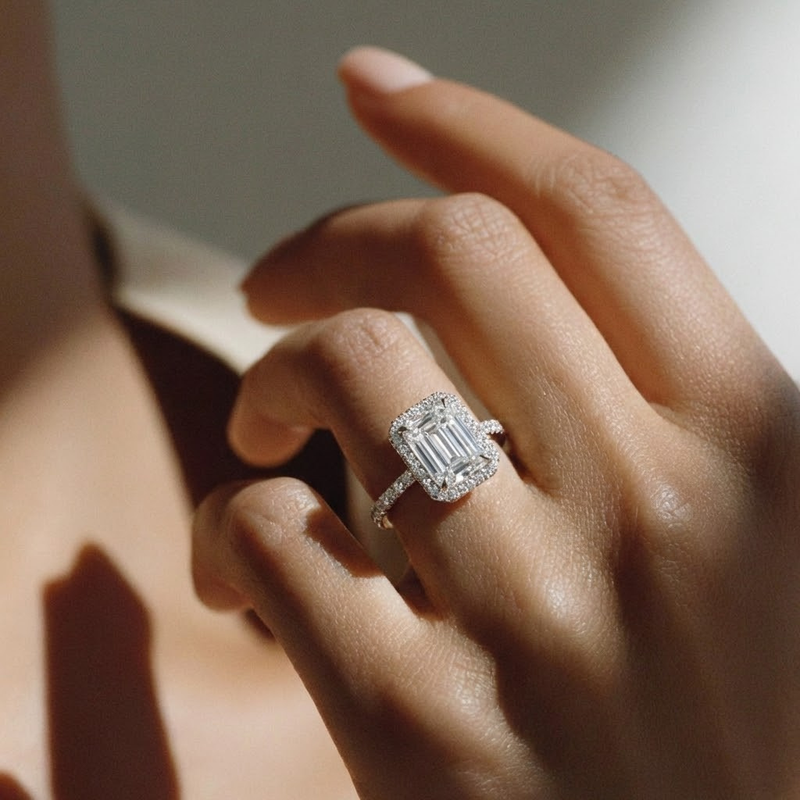 The Orion Ring – Emerald Halo with Pavé Band in 14K White Gold – The Jewel Concierge