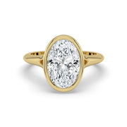 The Gabriella Ring — Oval Bezel with Split Band Lab-Grown Diamond Engagement Ring in Yellow Gold | The Jewel Concierge