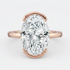 The Celine Ring – Oval Half Bezel Solitaire in 18K Rose Gold – The Jewel Concierge