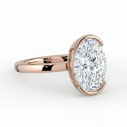 The Celine Ring — Oval Half Bezel Solitaire Lab-Grown Diamond Engagement Ring in Rose Gold | The Jewel Concierge