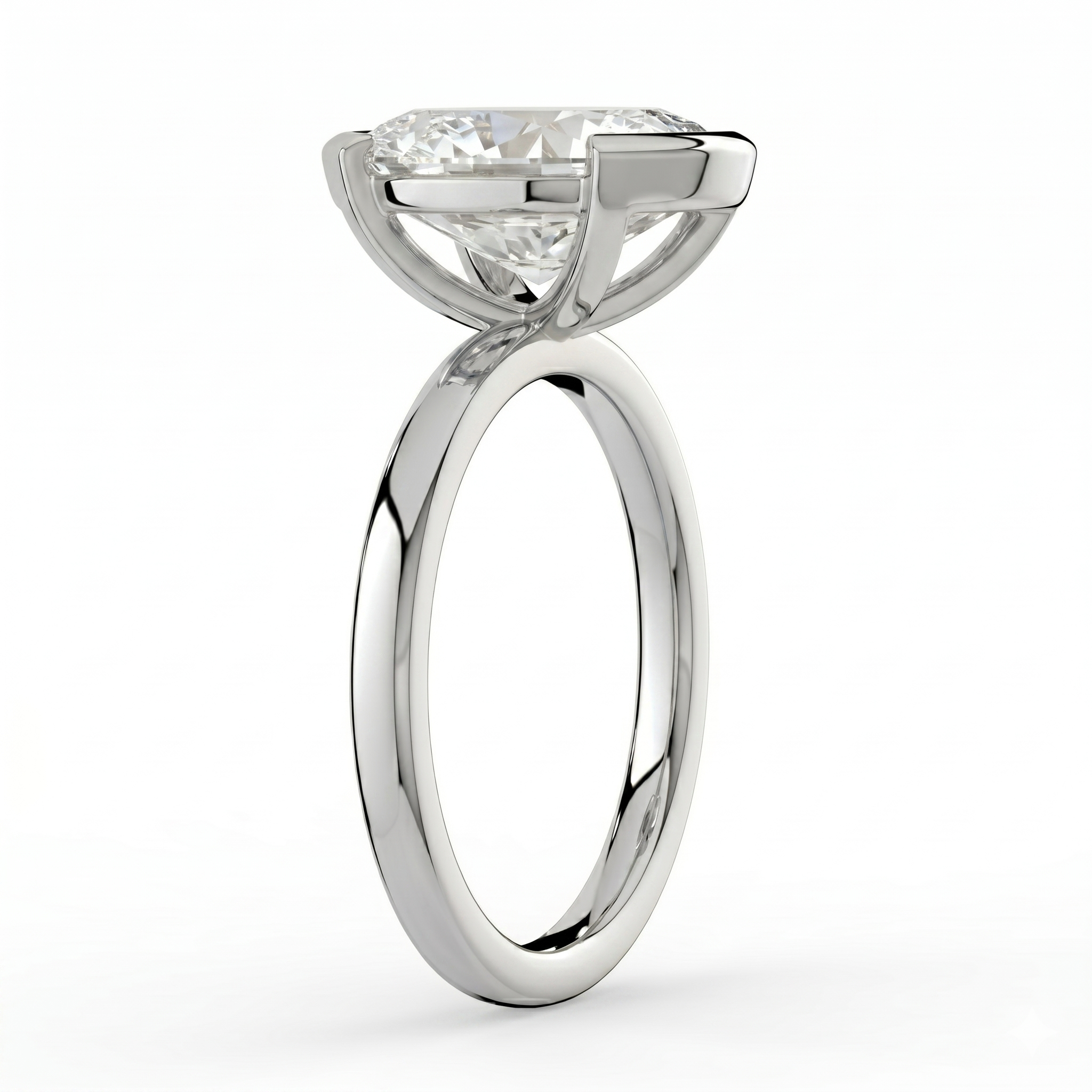 The Celine Ring – Oval Half Bezel Solitaire in 18K White Gold – The Jewel Concierge