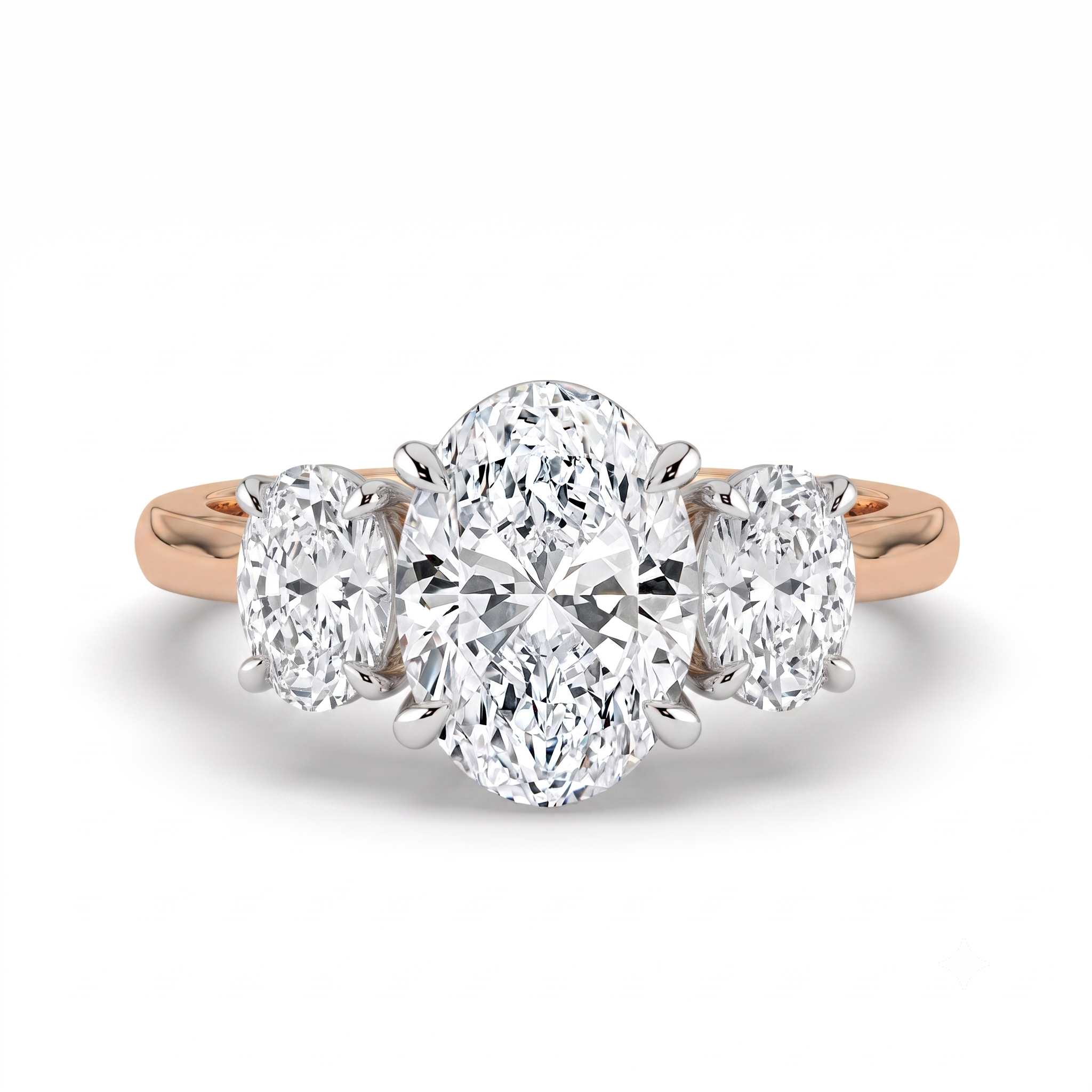 The Charlotte Ring - Oval trilogy in a two-tone rose gold & white gold setting | The Jewel Concierge