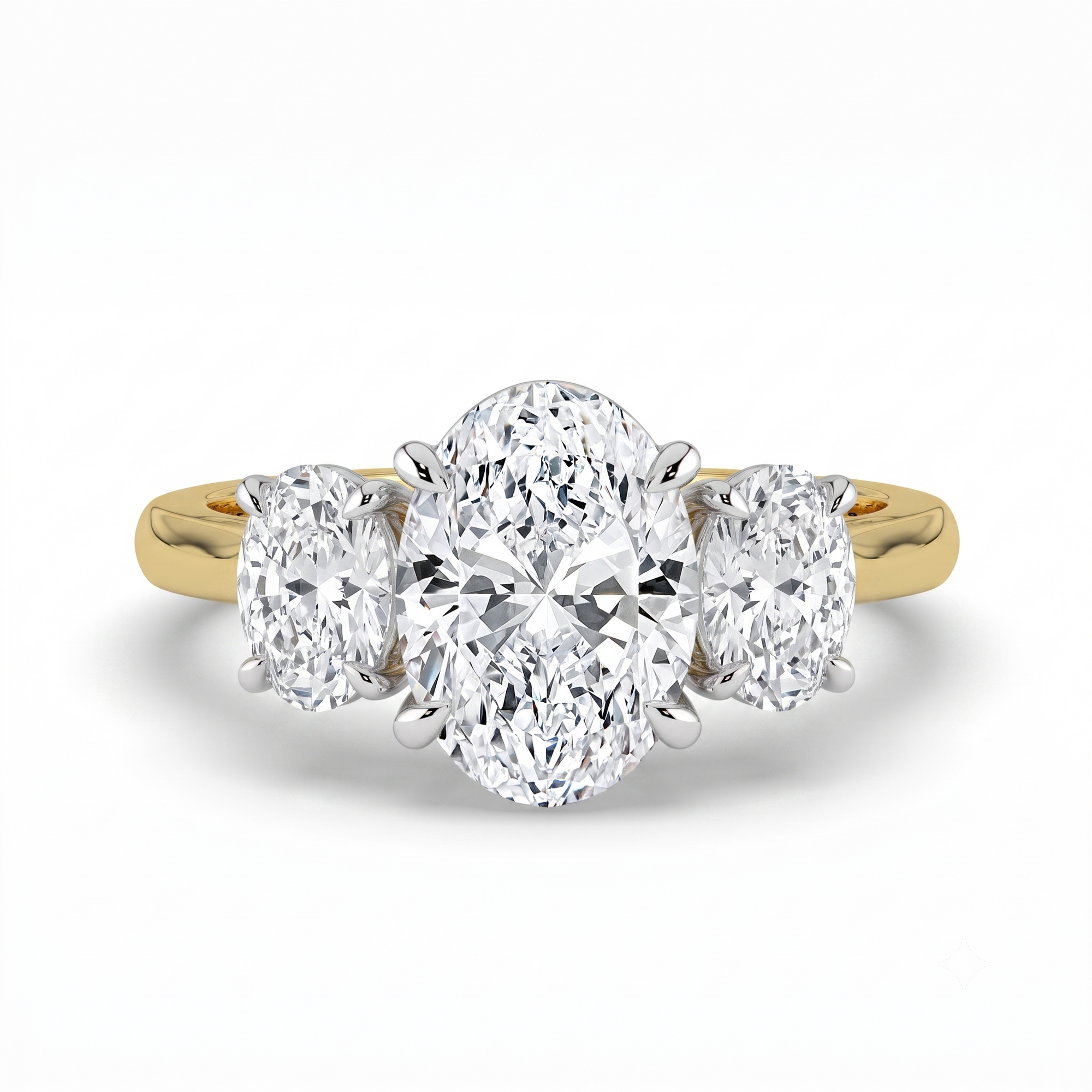 The Charlotte Ring - Oval trilogy in a two-tone yellow gold & white gold setting | The Jewel Concierge