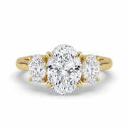The Charlotte Ring - Oval trilogy with a yellow gold band | The Jewel Concierge