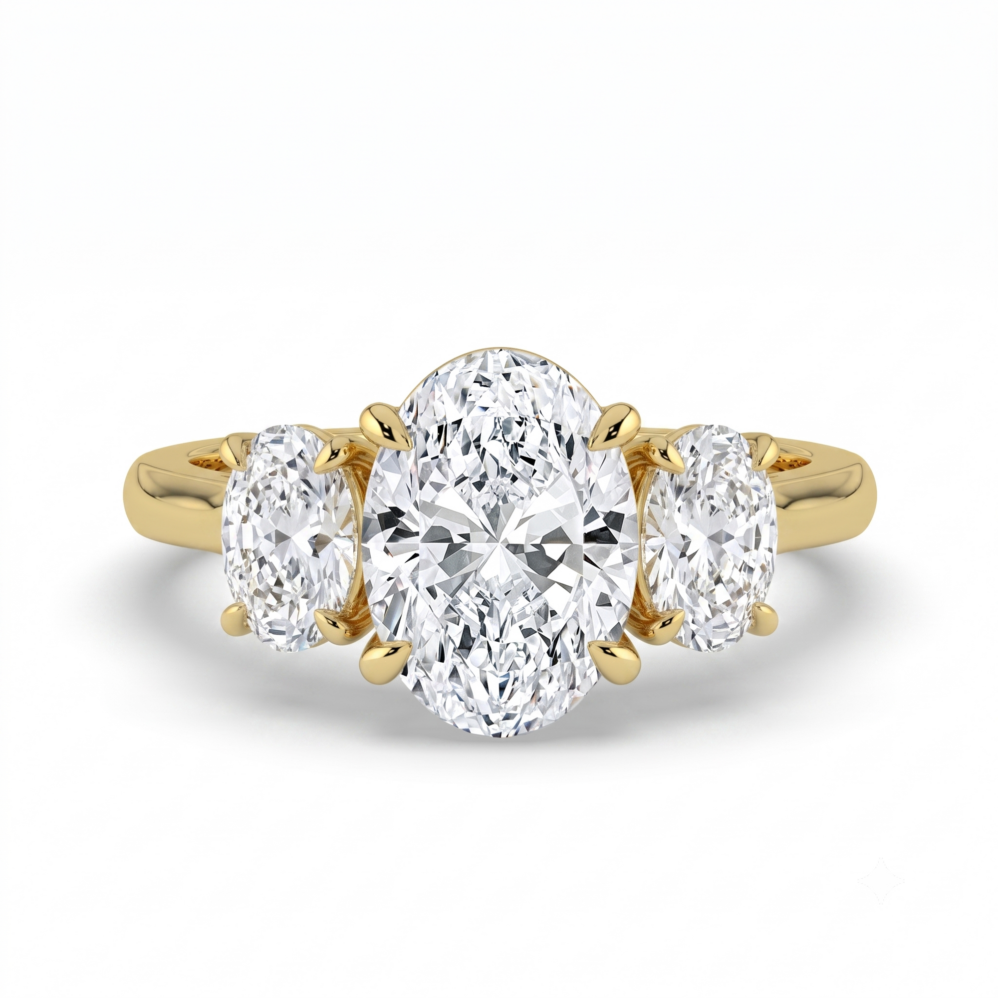 The Charlotte Ring - Oval trilogy with a yellow gold band | The Jewel Concierge