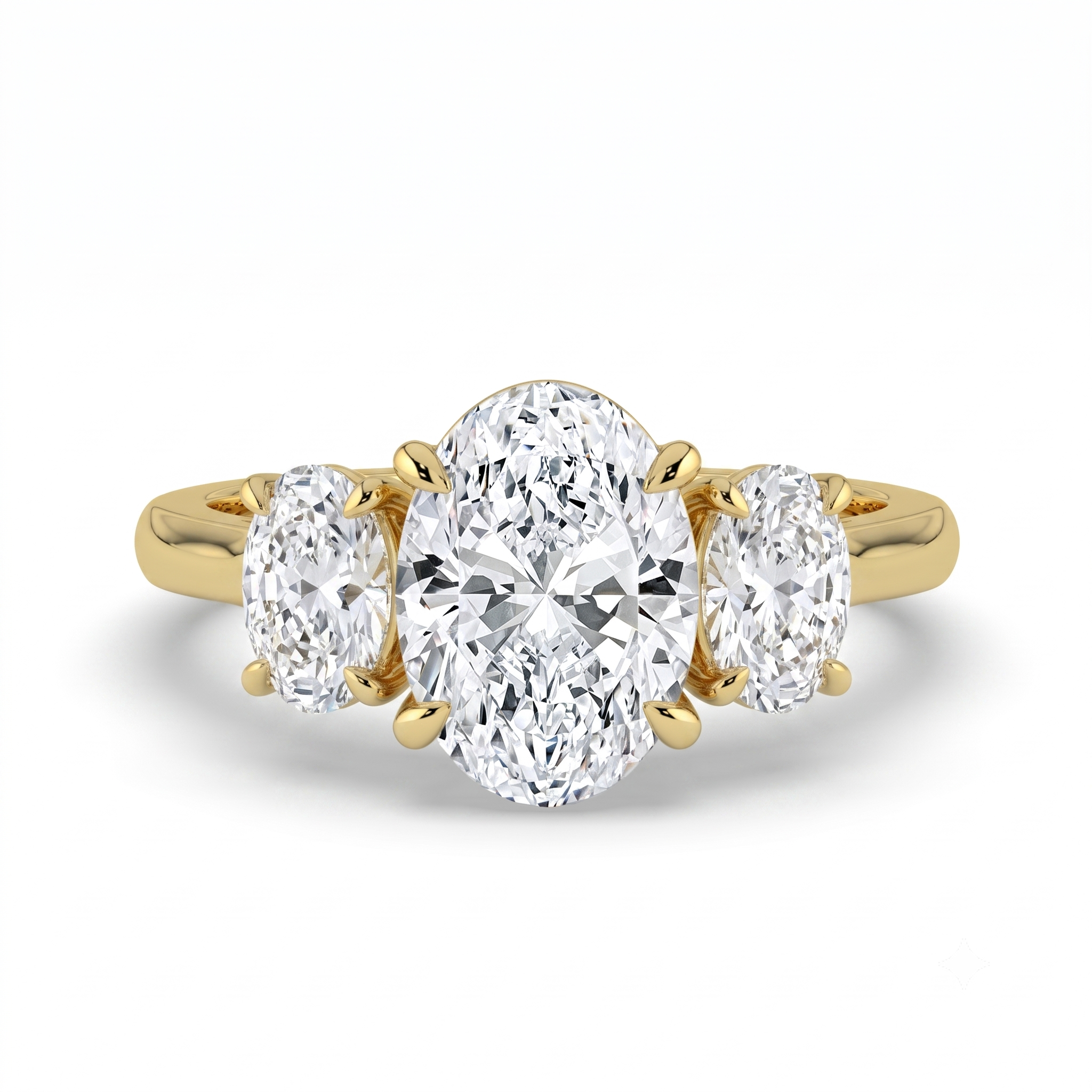 The Charlotte Ring - Oval trilogy with a yellow gold band | The Jewel Concierge