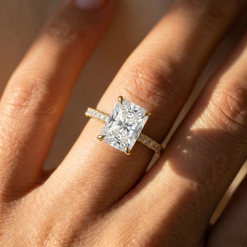 The Phoenix Ring – Radiant Solitaire with Hidden Halo & Pavé Band in 18K Yellow Gold and Rose Gold – The Jewel Concierge