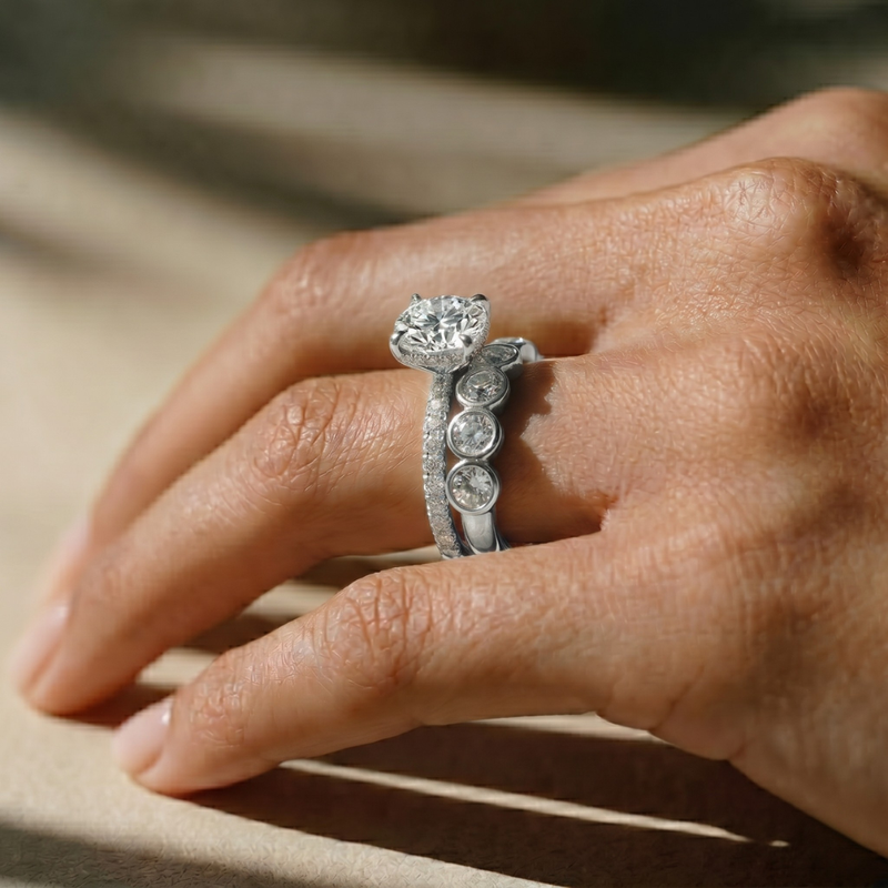 The Phoenix Ring – 4 Claw Round Solitaire with Hidden Halo & Pavé Band in 18K White Gold– The Jewel Concierge