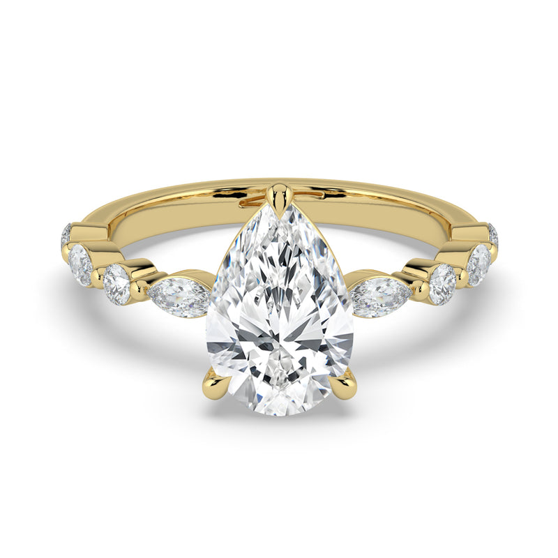 The Vega Ring – Pear with Marquise & Round Accents in 14K Yellow Gold – The Jewel Concierge