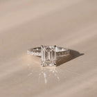 The Phoenix Ring — Emerald Solitaire with Hidden Halo & Pavé Band Lab-Grown Diamond Engagement Ring in White Gold | The Jewel Concierge