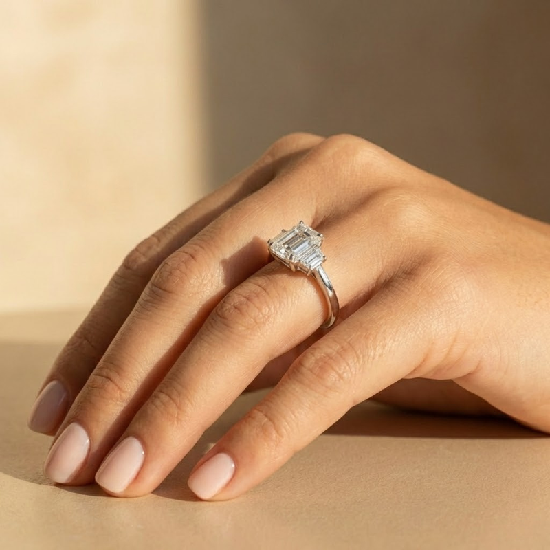 The Selene Ring – Emerald & Trapezoid Trilogy in 14K White Gold – The Jewel Concierge
