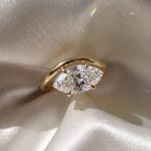 The Solis Ring — Curved East West Marquise Cut on a luxurious silk fabric | The Jewel Concierge
