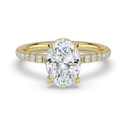 The Astra Ring – Oval Solitaire with Pavé Band in 14K Yellow Gold – The Jewel Concierge