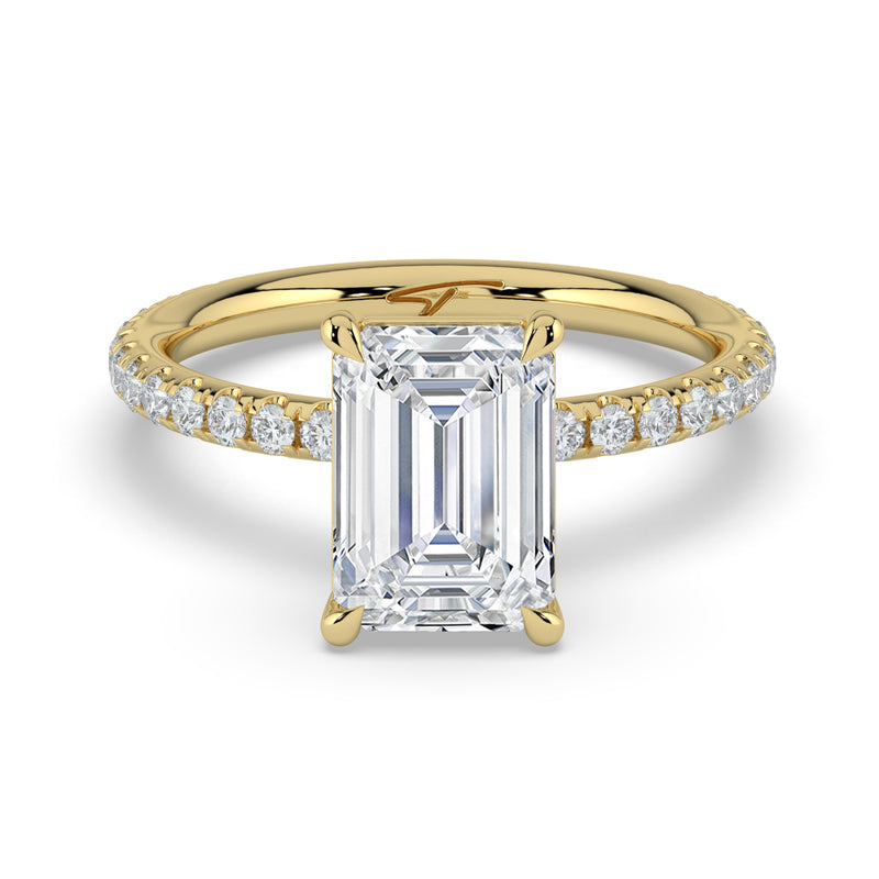 The Astra Ring – Emerald Solitaire with Pavé Band in 14K Yellow Gold – The Jewel Concierge
