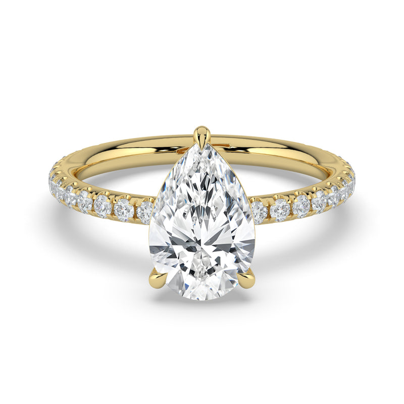 The Astra Ring – Pear Solitaire with Pavé Band in 14K Yellow Gold – The Jewel Concierge