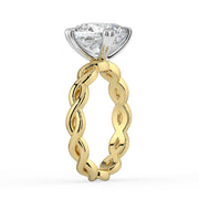 The Elysande Ring – Cushion Solitaire with Braided Band in 18K White Gold and Yellow Gold – The Jewel Concierge