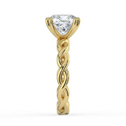 The Elysande Ring – Cushion Solitaire with Braided Band in 18K Yellow Gold – The Jewel Concierge