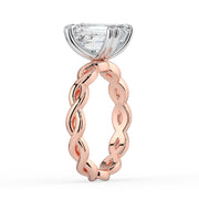 The Elysande Ring – Emerald Solitaire with Braided Band in 18K White Gold and Rose Gold – The Jewel Concierge