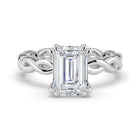 The Elysande Ring -  Emerald Solitaire with Braided Band