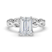 The Elysande Ring – Emerald Solitaire with Braided Band – The Jewel Concierge