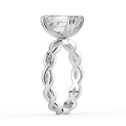 The Elysande Ring – Emerald Solitaire with Braided Band in 14K White Gold and Yellow Gold – The Jewel Concierge