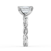 The Elysande Ring – Emerald Solitaire with Braided Band in 18K White Gold – The Jewel Concierge