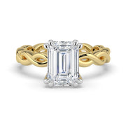 The Elysande Ring – Emerald Solitaire with Braided Band – The Jewel Concierge