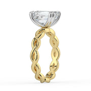 The Elysande Ring – Emerald Solitaire with Braided Band in 18K White Gold and Yellow Gold – The Jewel Concierge