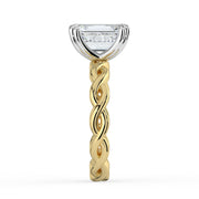 The Elysande Ring – Emerald Solitaire with Braided Band in Platinum – The Jewel Concierge