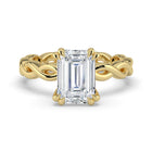 The Elysande Ring -  Emerald Solitaire with Braided Band