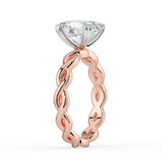 The Elysande Ring – Oval Solitaire with Braided Band in 18K White Gold and Rose Gold – The Jewel Concierge