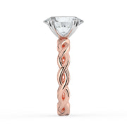 The Elysande Ring – Oval Solitaire with Braided Band – The Jewel Concierge