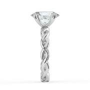 The Elysande Ring – Oval Solitaire with Braided Band in 18K White Gold – The Jewel Concierge