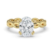 The Elysande Ring – Oval Solitaire with Braided Band in 14K Yellow Gold – The Jewel Concierge