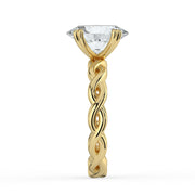 The Elysande Ring – Oval Solitaire with Braided Band in 18K Yellow Gold – The Jewel Concierge