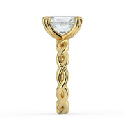 The Elysande Ring – Radiant Solitaire with Braided Band in 18K Yellow Gold – The Jewel Concierge