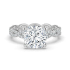 The Elysande Ring - Cushion Solitaire with Braided Pavé Band