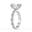 The Elysande Ring - Emerald Solitaire with Braided Pavé Band