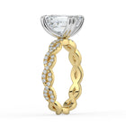 The Elysande Ring - Emerald Solitaire with Braided Pavé Band