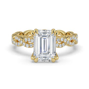 The Elysande Ring – Emerald Solitaire with Braided Pavé Band in 14K Yellow Gold – The Jewel Concierge