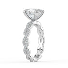 The Elysande Ring - Oval Solitaire with Braided Pavé Band