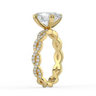 The Elysande Ring - Oval Solitaire with Braided Pavé Band