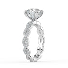 The Elysande Ring - Round Solitaire with Braided Pavé Band