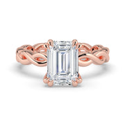 The Elysande Ring – Emerald Solitaire with Braided Band – The Jewel Concierge