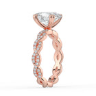 The Elysande Ring - Oval Solitaire with Braided Pavé Band